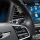 Illustration for article titled Genesis G80 Sport, The Blue Seated Carbon Fiber Trimmed Gold Stiched Steering Wheel Twin-Turbo Sedan All Three Of Us Have Been Waiting For...